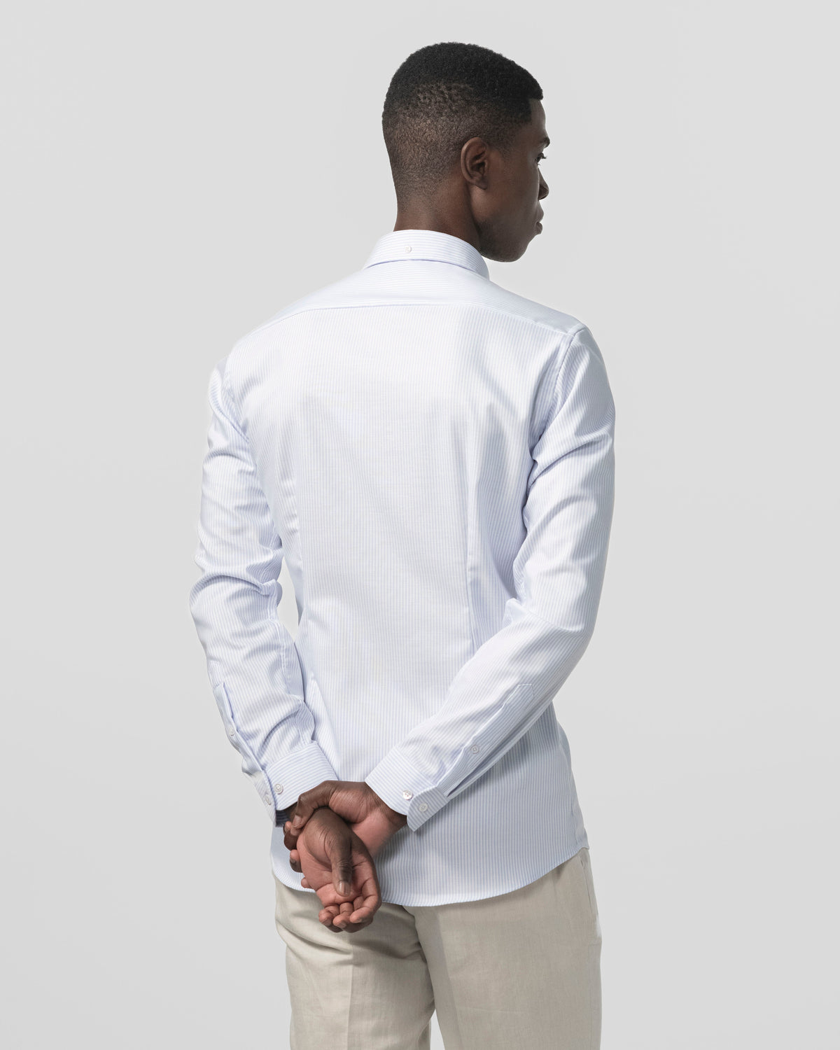 The Founder Light Blue Stripe back